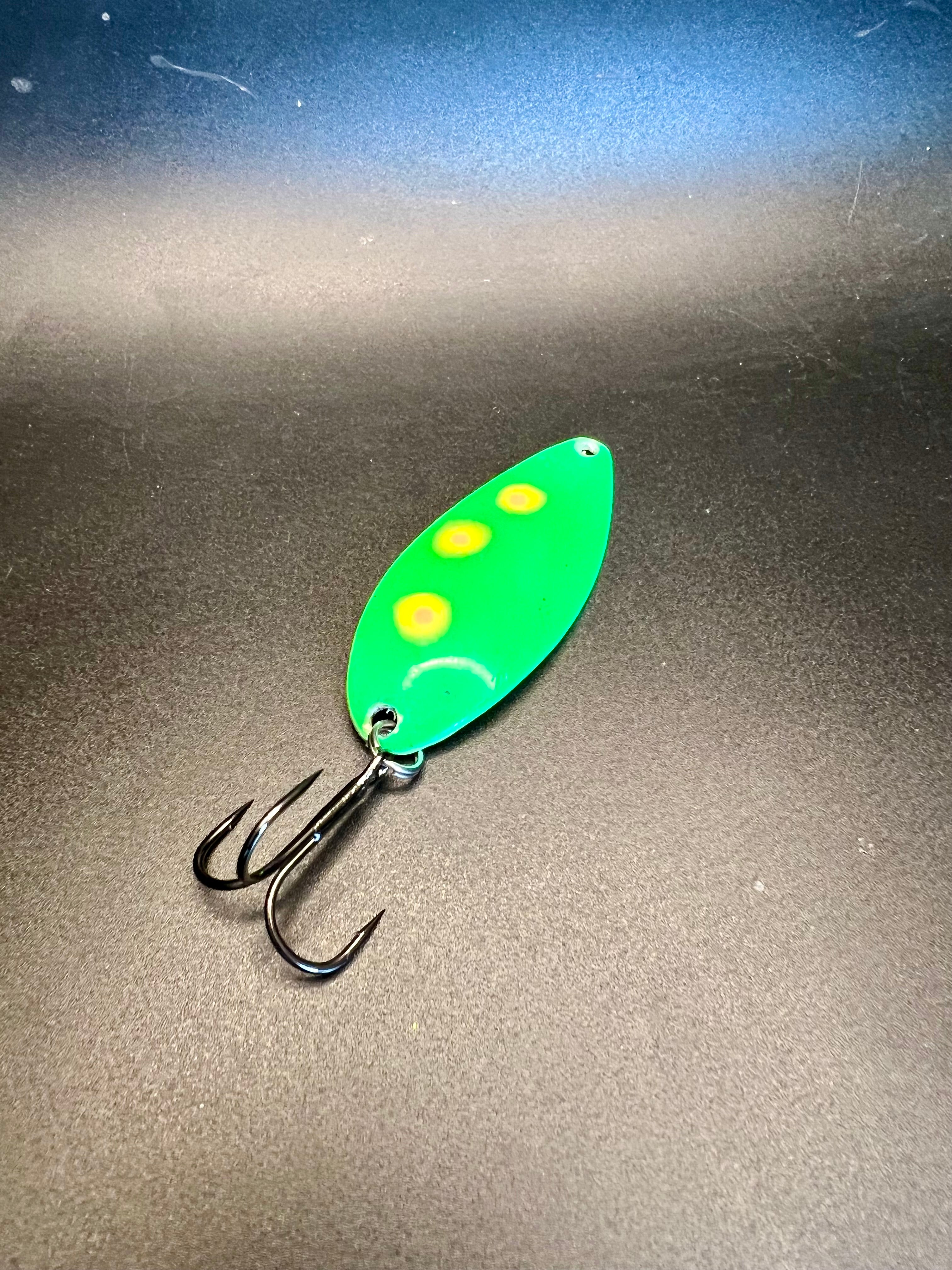 Biohazard 1/2 oz Little Cletus lure, neon green with yellow spots and treble hooks