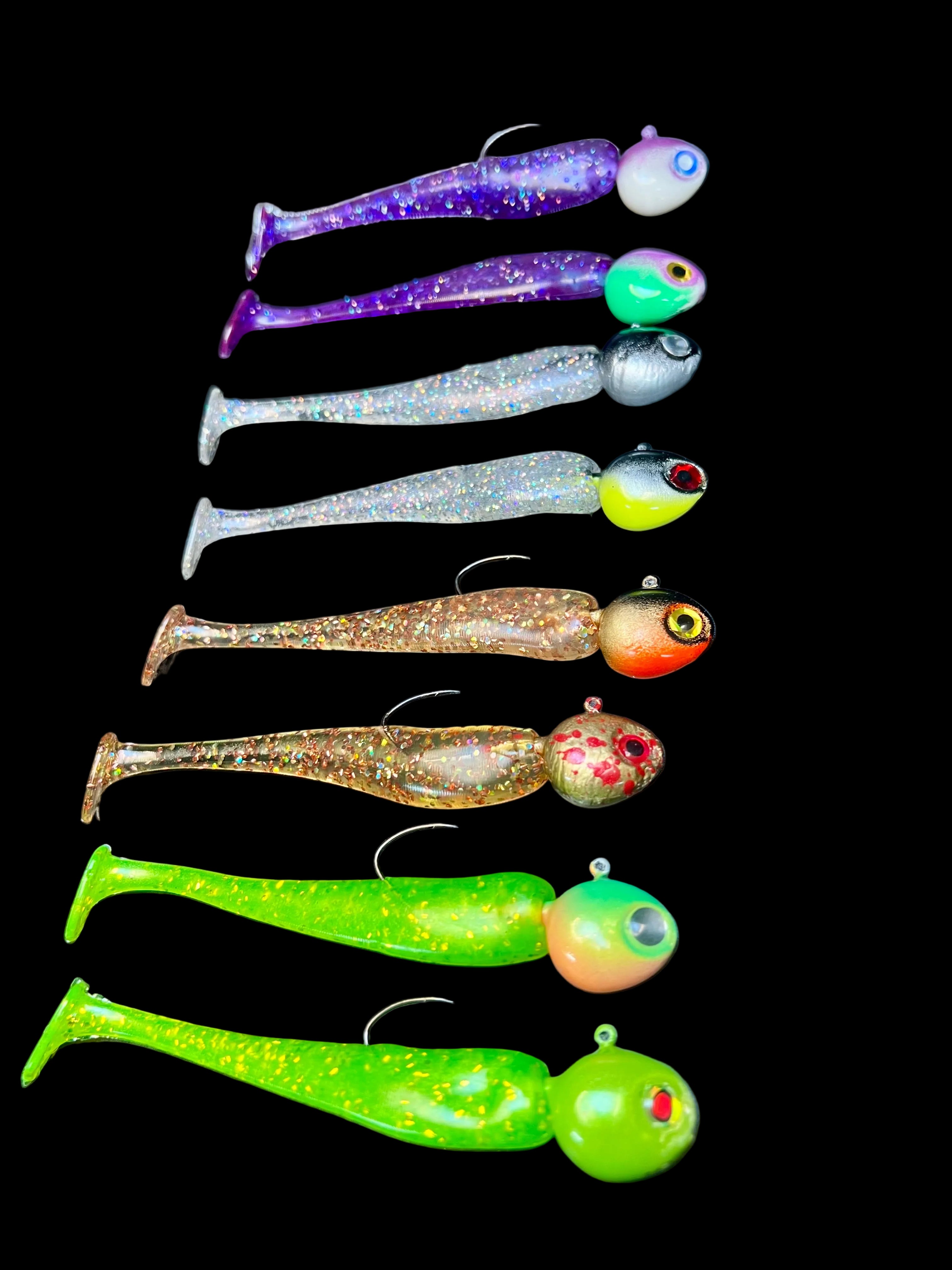 Paddle tail swimbaits, mixed colors with round jig heads and glitter bodies