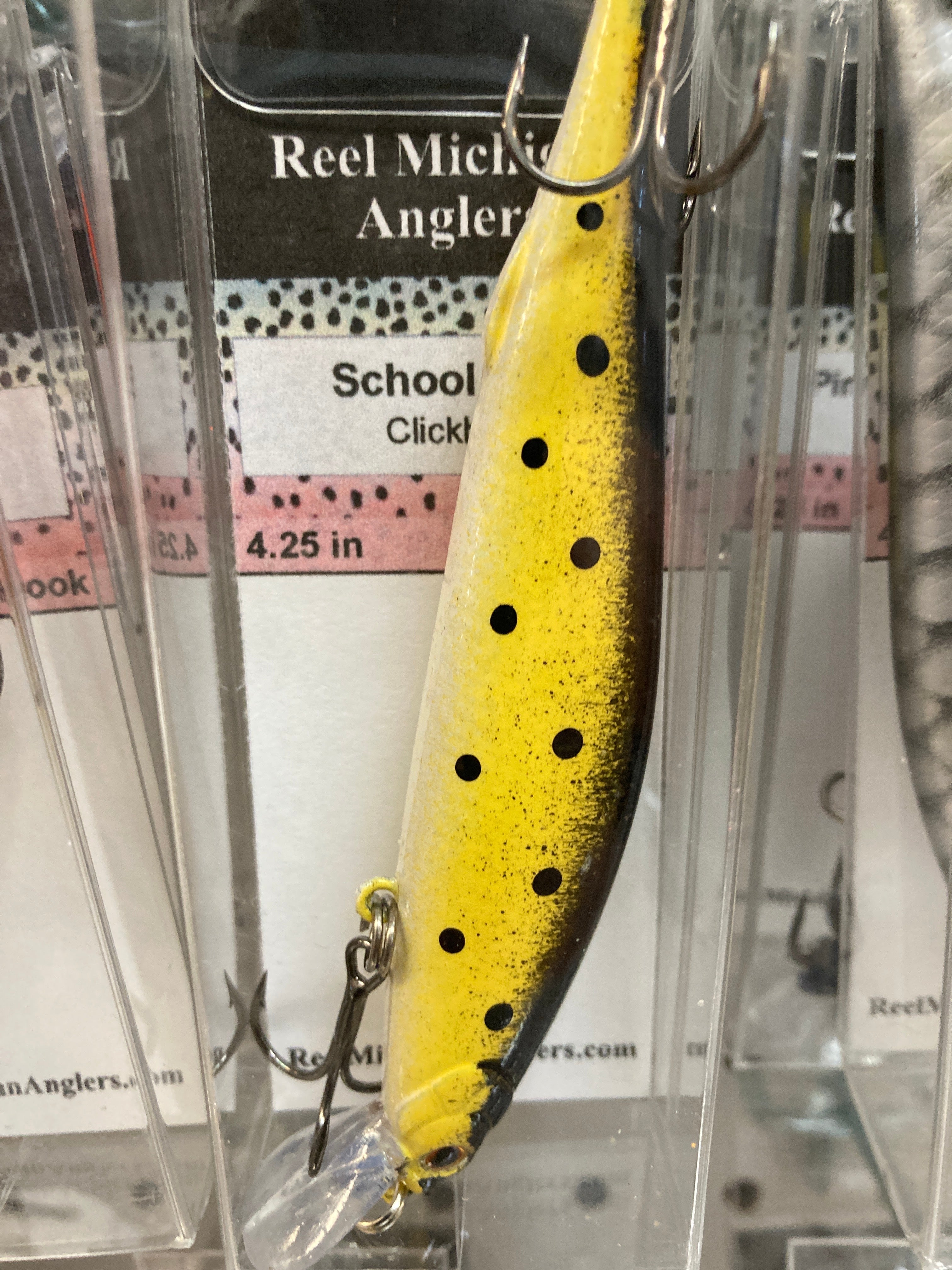 4.25 in fishing lure, yellow with black dots, lip and double hooks