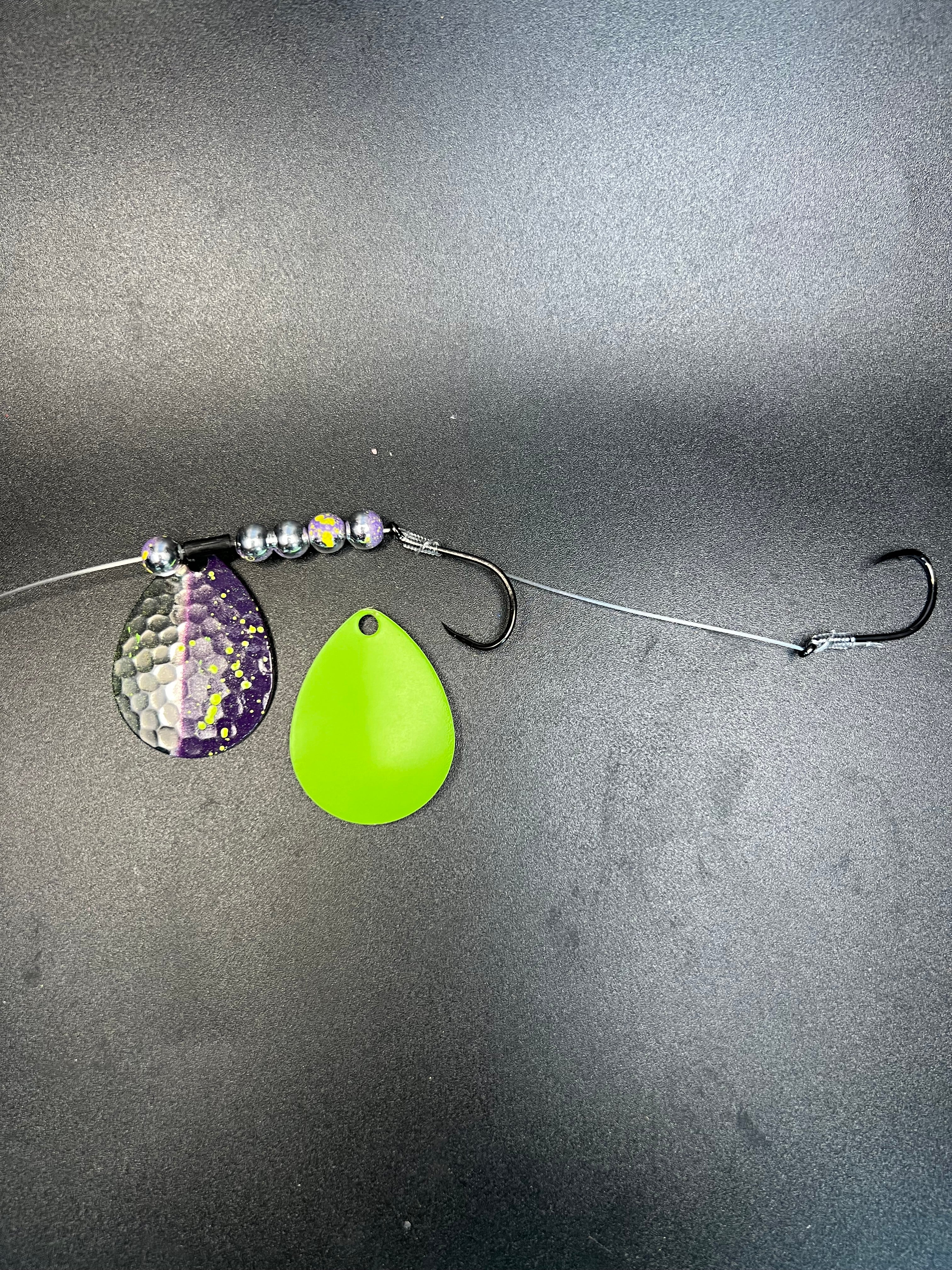 Walter’s Plumb Crawler harness with purple and green spinner blades and two hooks