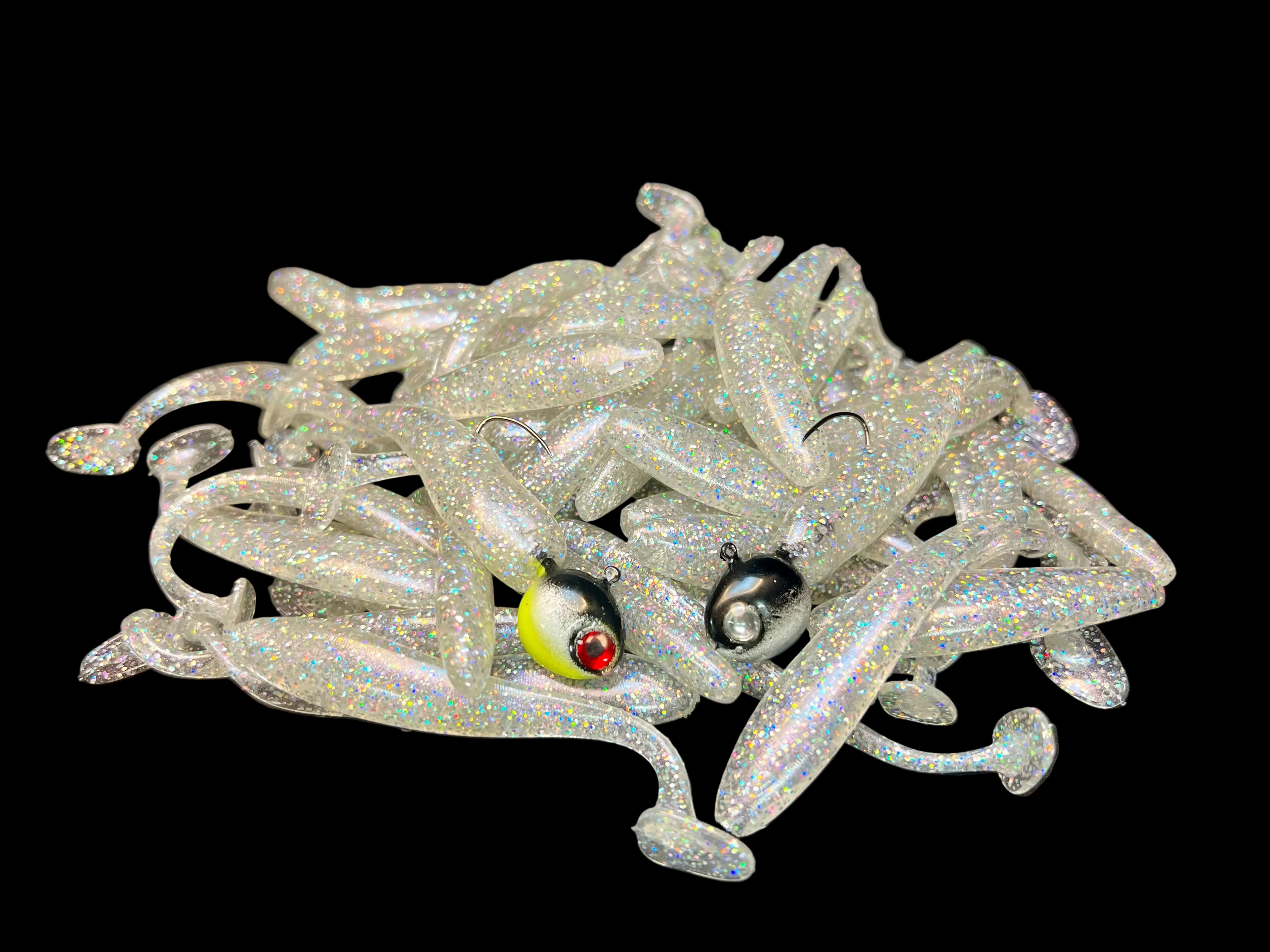 Silver glitter paddle tail swimbaits with jig heads and paddle tails