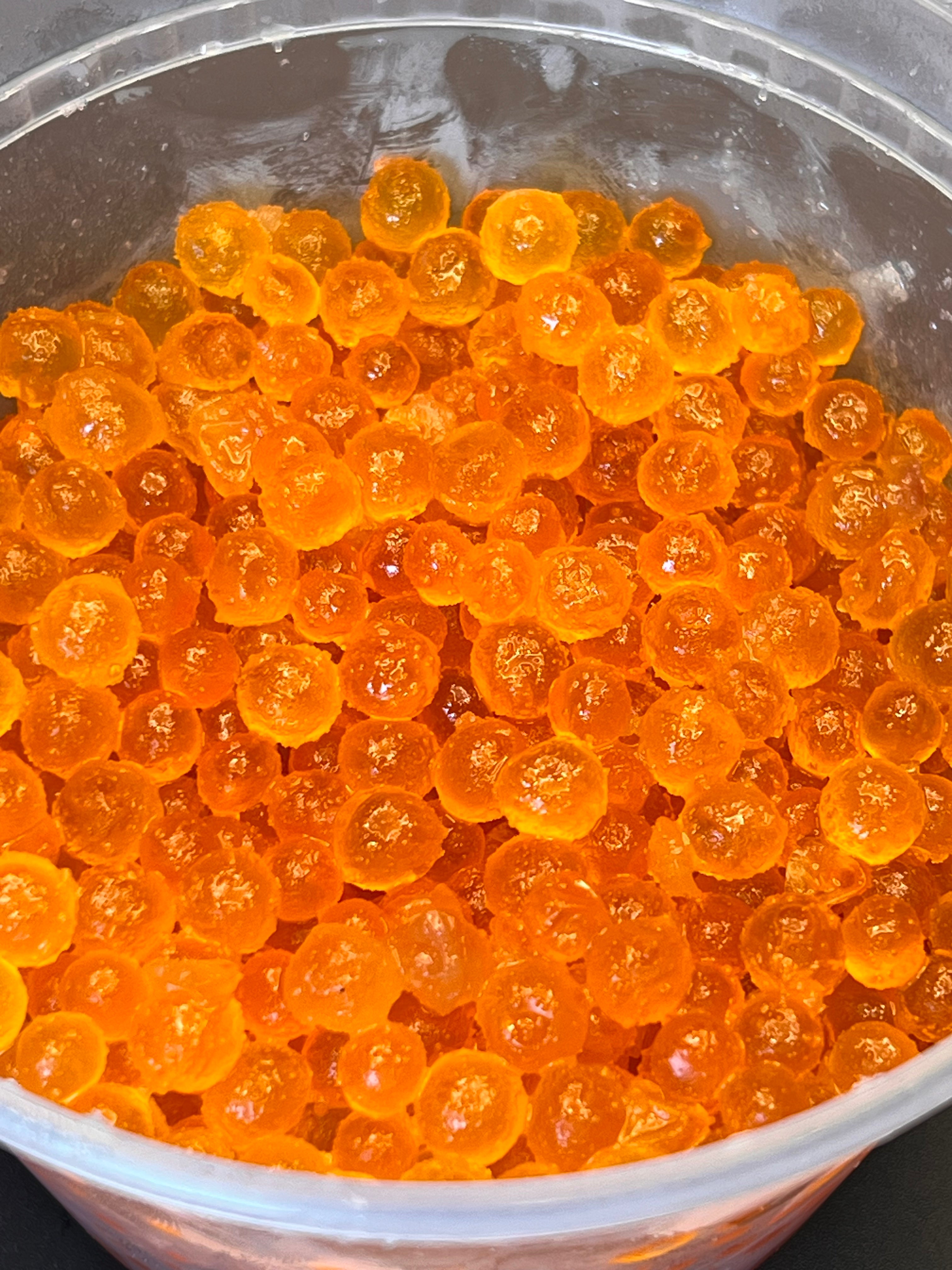 Loose orange salmon roe in a bowl