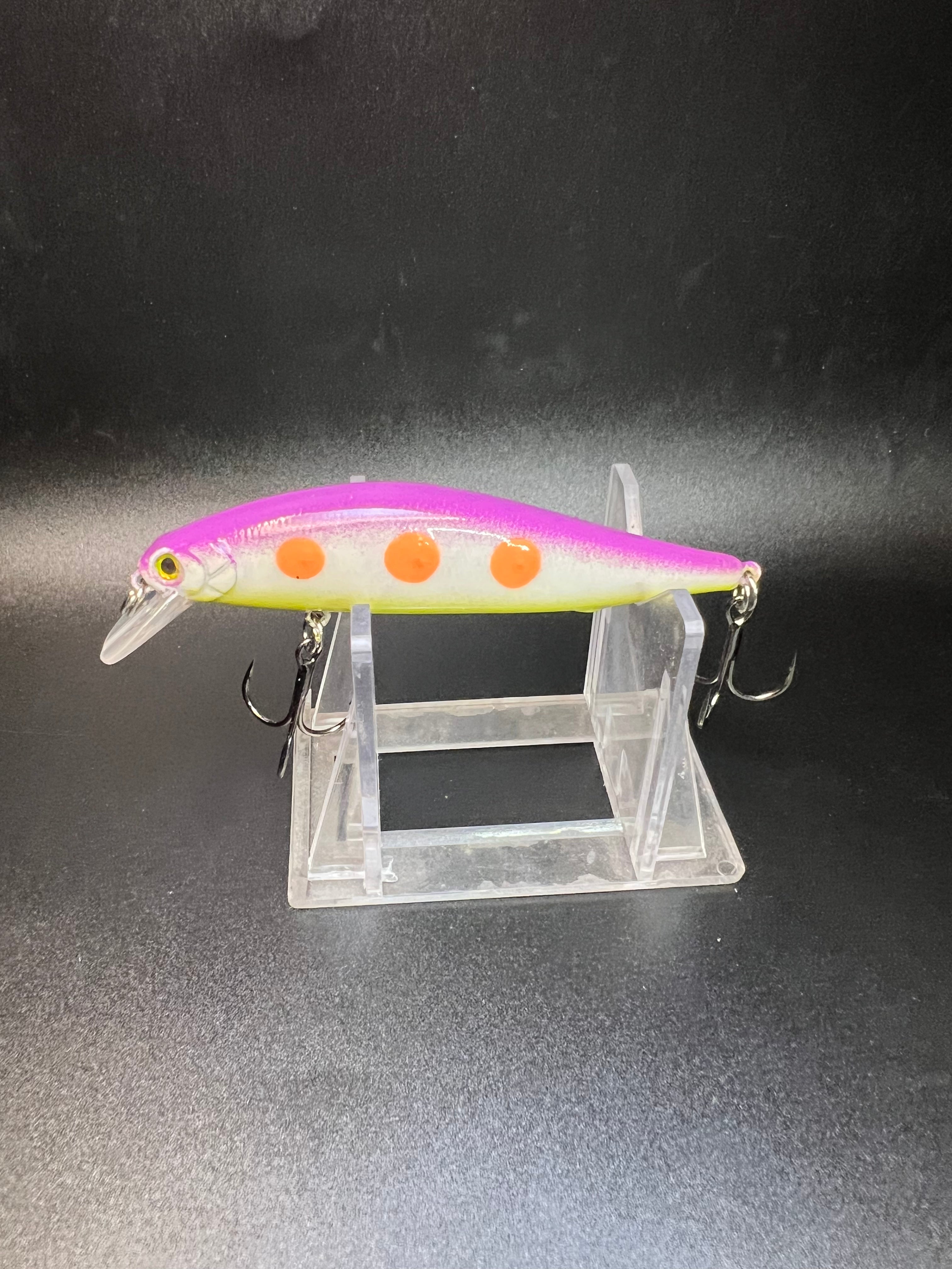Jerkbait 3.5 in, pink/yellow with orange spots, clear lip, two treble hooks