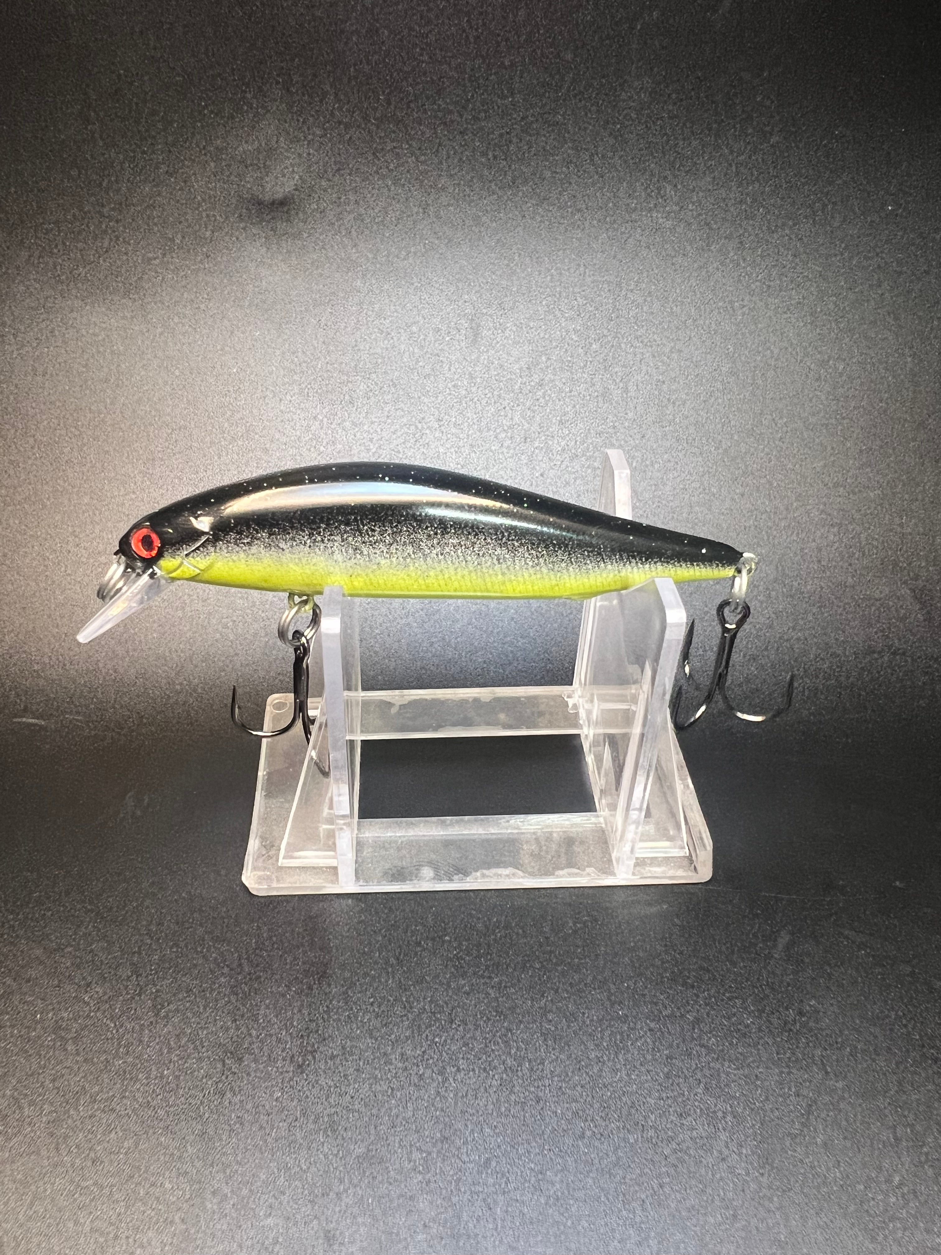 Steelie Dan Clickbait jerkbait 3.5 in, silver/black with chartreuse belly, red eye