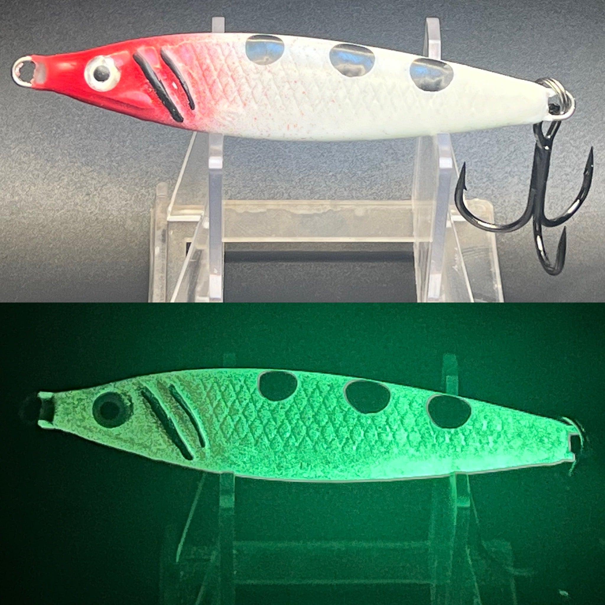 Jigging spoon lure in red/white and green with dot eyes and treble hooks