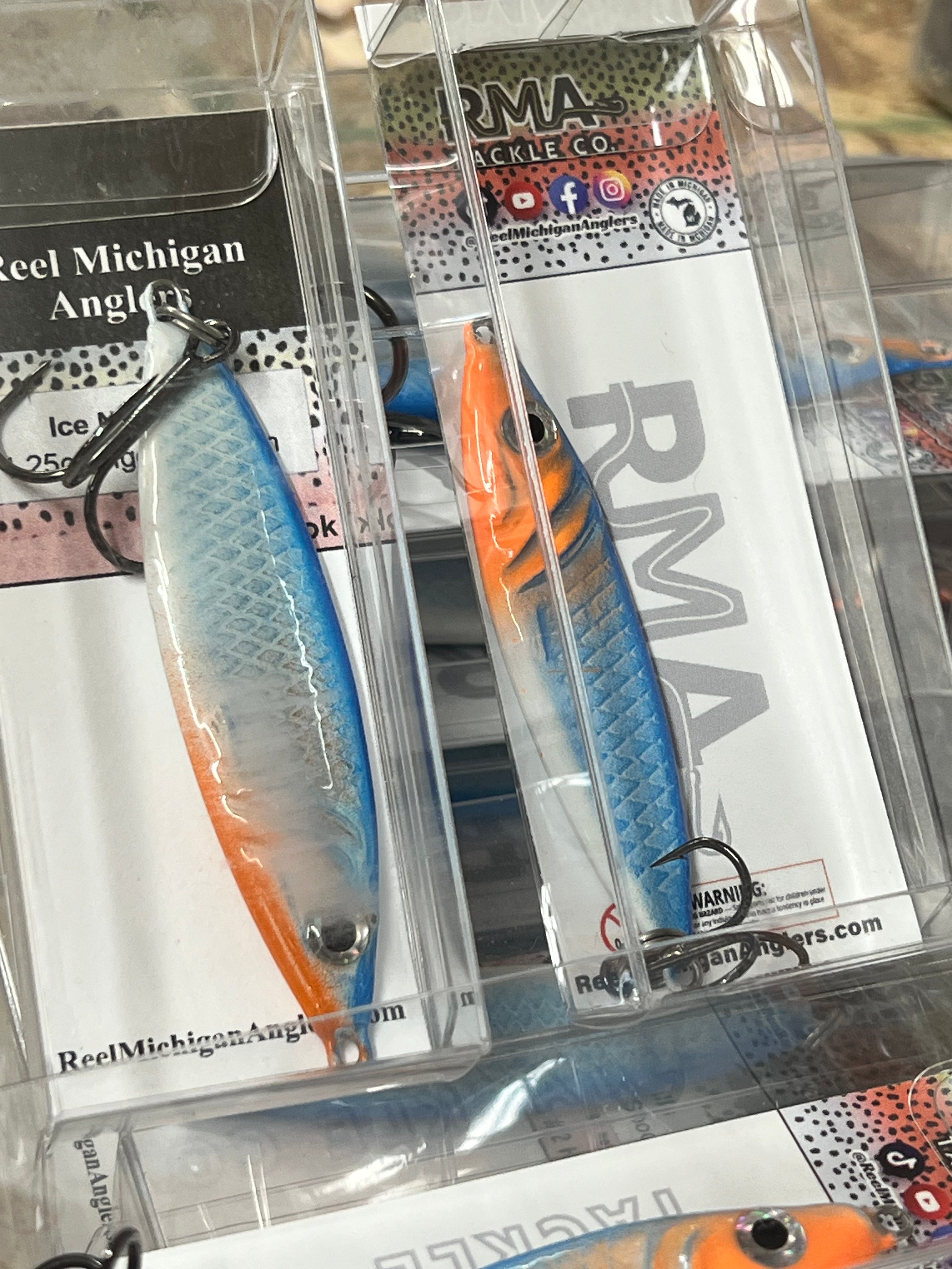 Ice 9 Gills UV glow jigging spoon set, blue body with orange glow accents