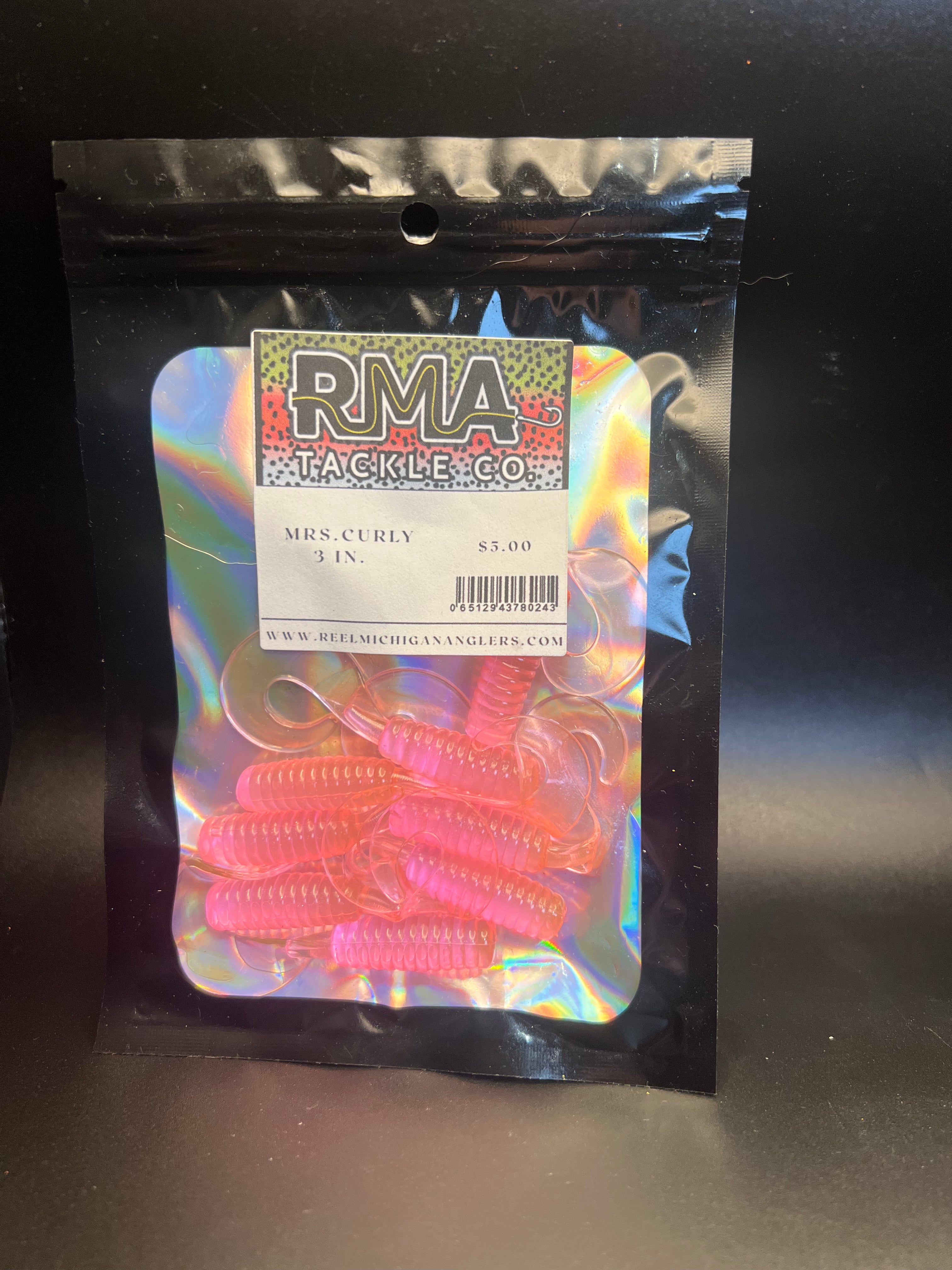 Package label for Mrs. Curly Twister tail grubs with pink soft plastics