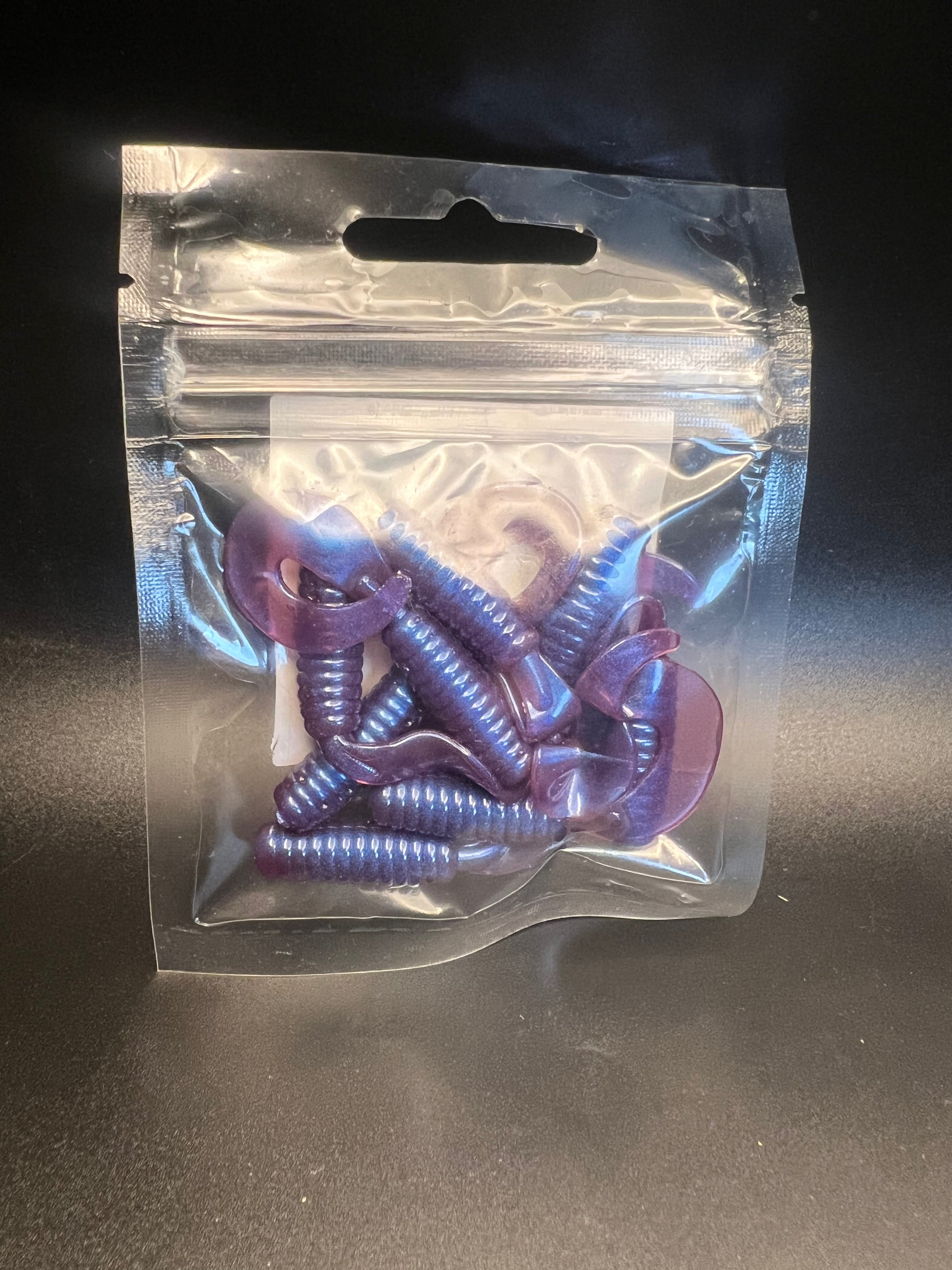 Purple curly twister tail grub soft plastics in clear blister bag