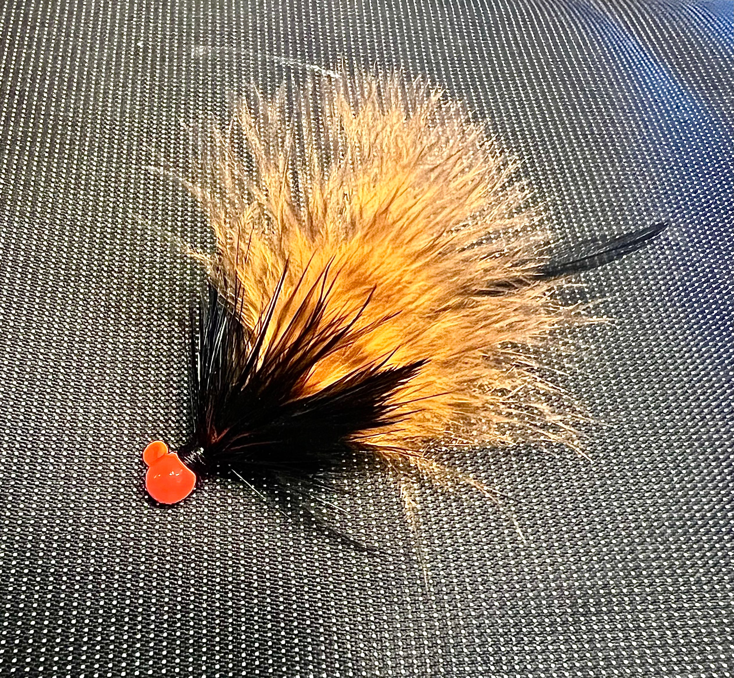 Marabou steelhead jig with orange and black tail, #4 hook, red bead