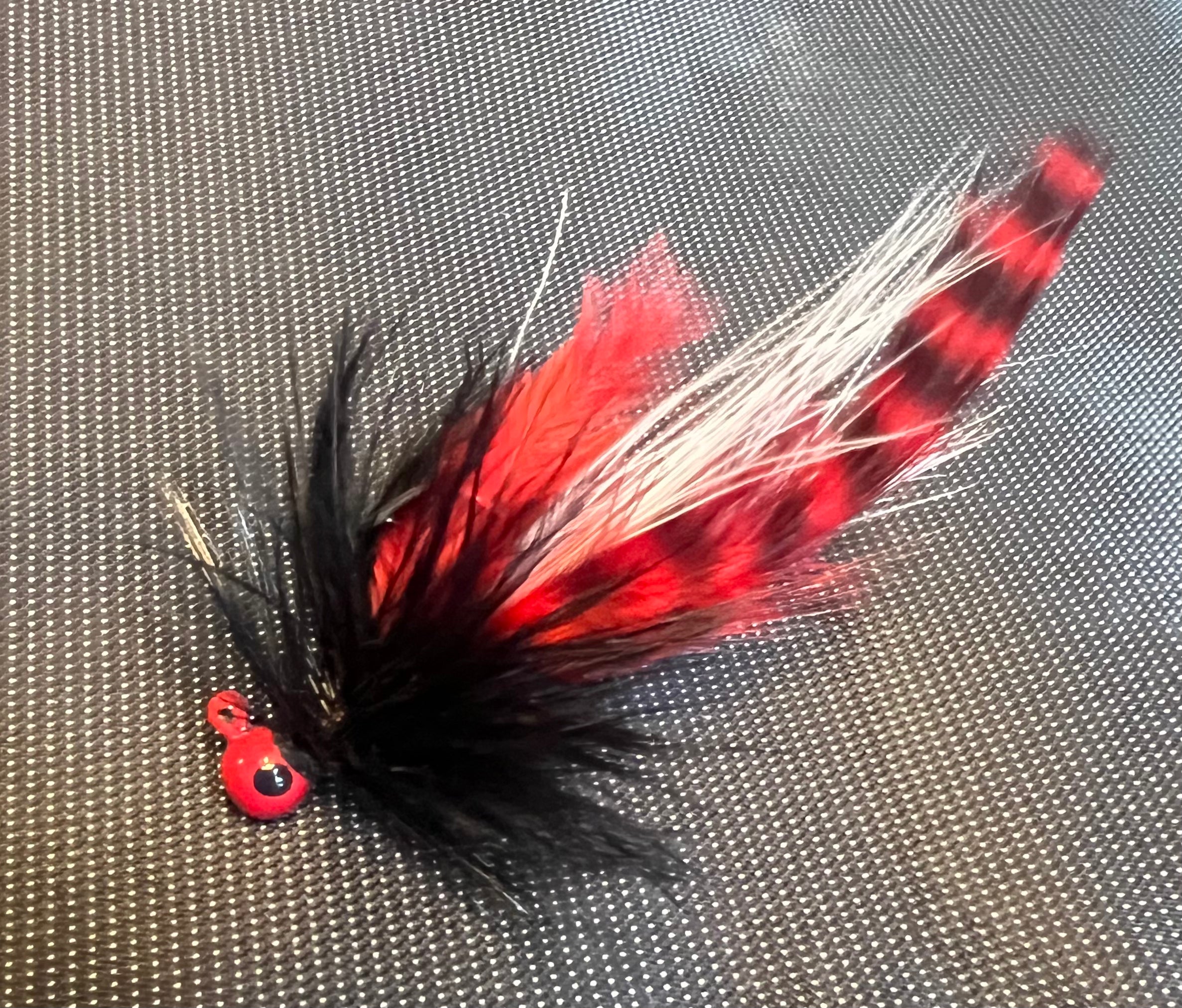 Ladybug UV glow steelhead hair jig with red-and-black marabou, #4 hook