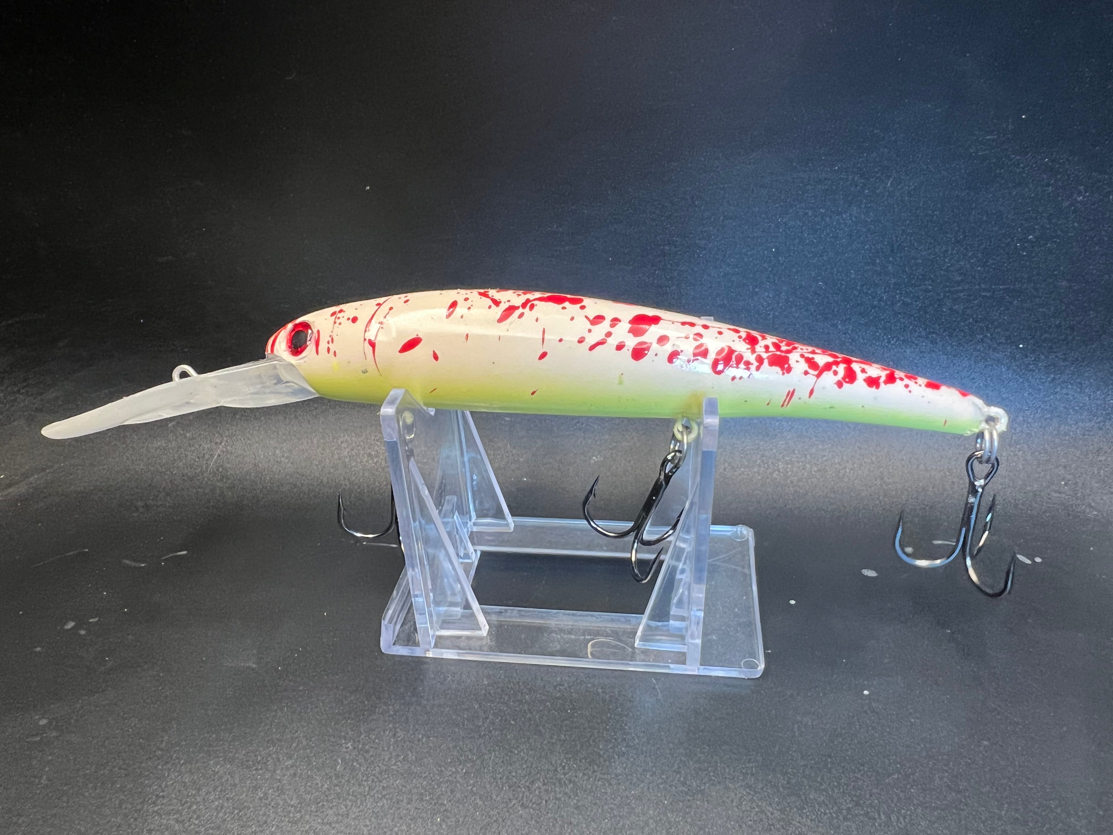Dedfsh UV walleye trolling lure, green body with red speckles and twin treble hooks