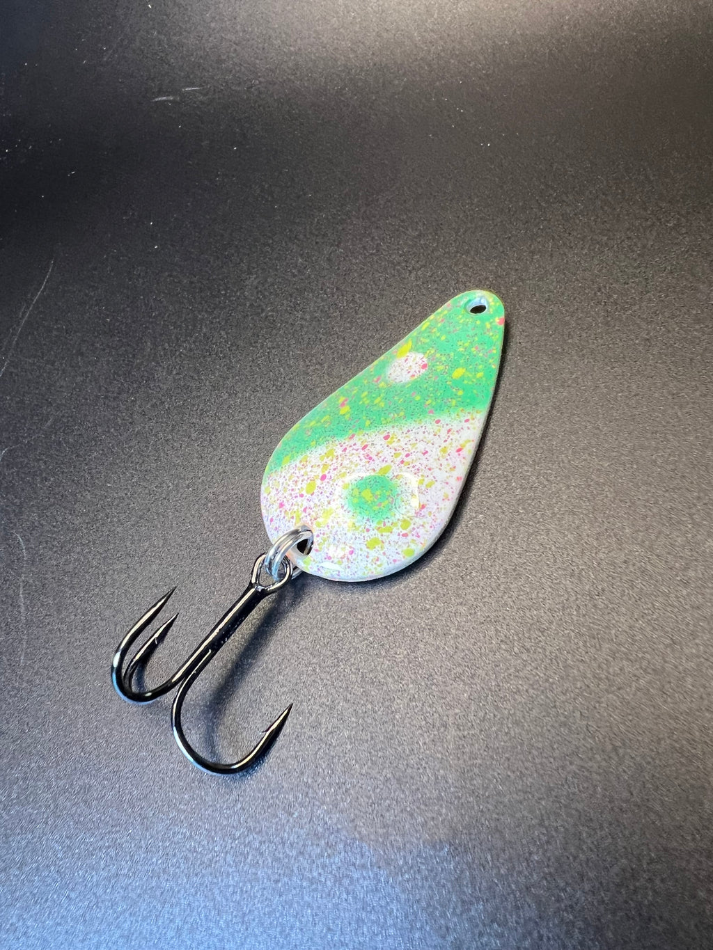 Peir Mellon Glow TJ Bobbler fishing lure, green-white speckled teardrop with treble hooks