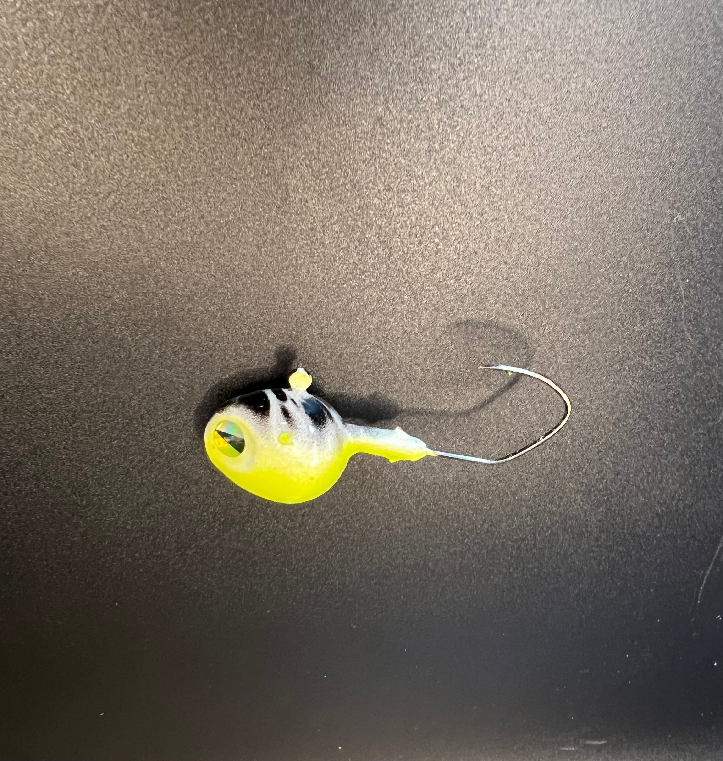 Fire Liger UV walleye jig, yellow/black head with treble hook