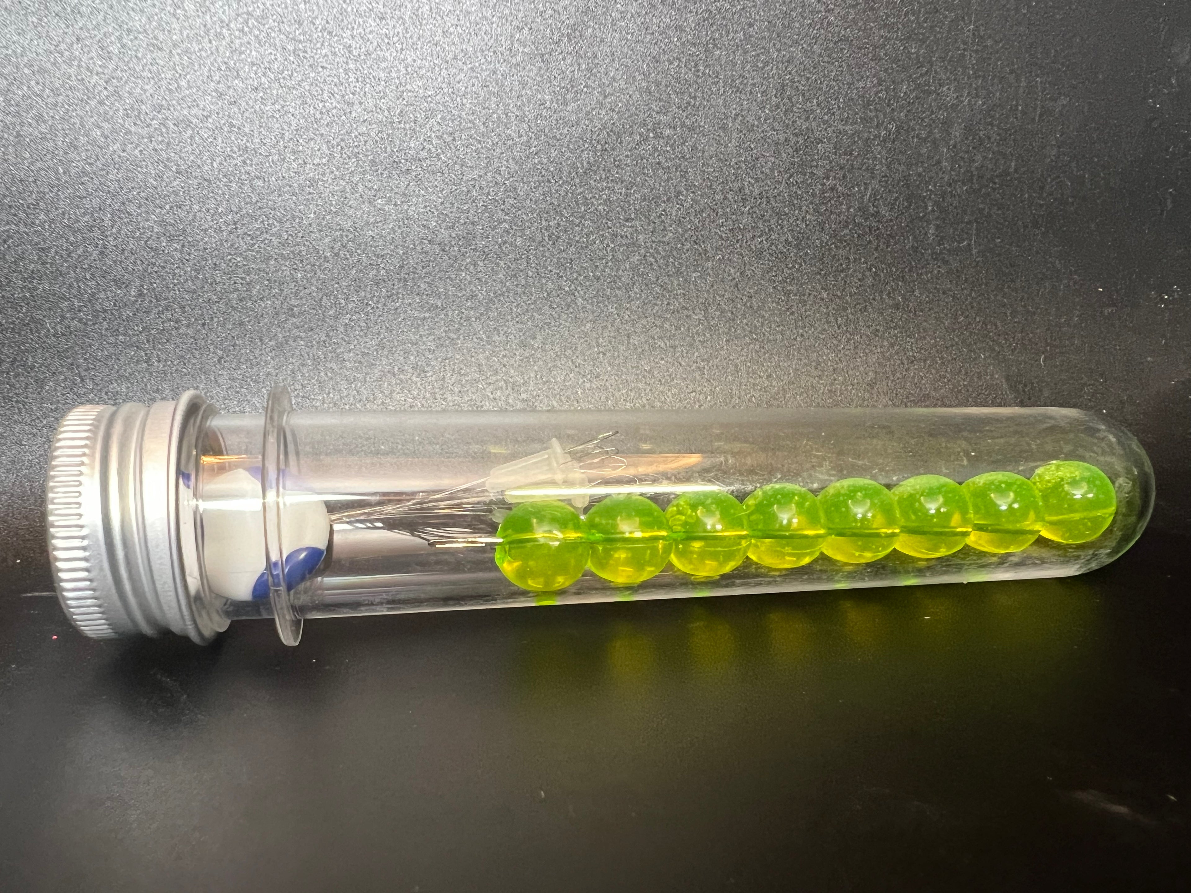 Slimer soft plastic beads for salmon & steelhead, clear tube with neon green beads