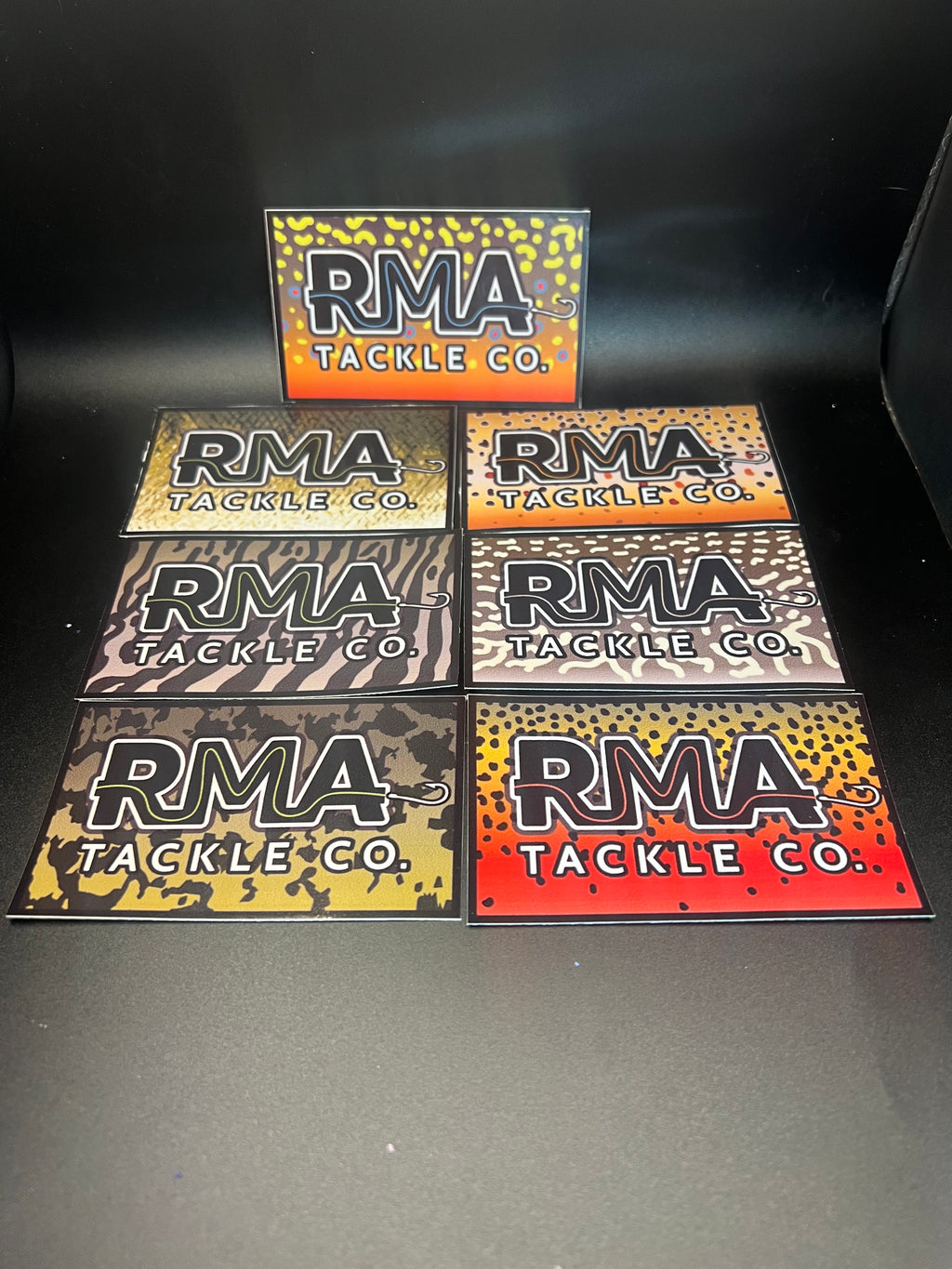 RMA Stickers set of six with RMA TACKLE CO logo on camo-pattern backgrounds