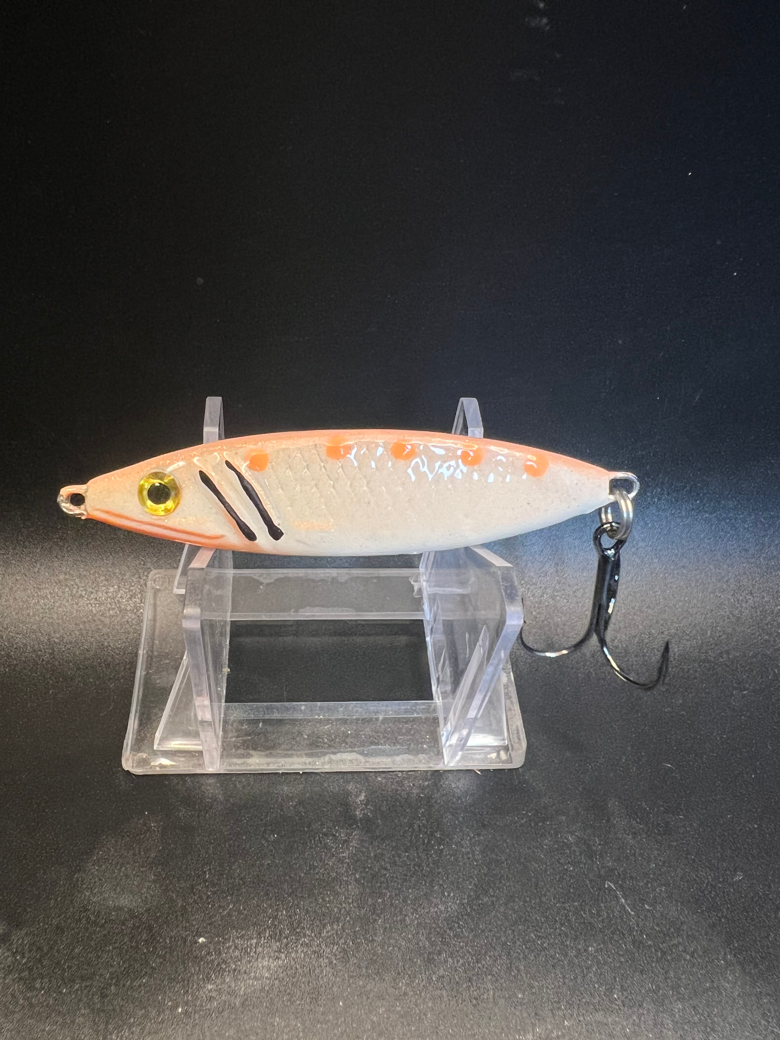 Chumphrey's Mcgee UV 1.25 oz Salmon jigging spoon, orange-white with black stripe