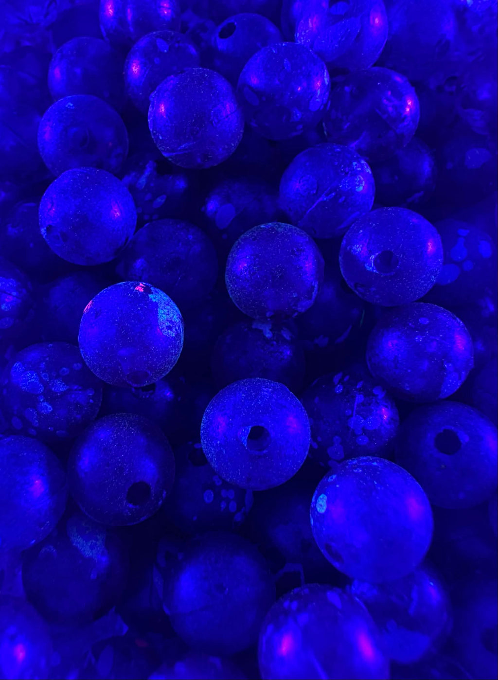Winterberry UV glow fishing beads, blue plastic spheres with center holes