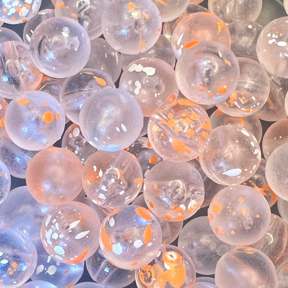 Clear water Nemo UV glow plastic fishing beads, clear with orange speckle, translucent