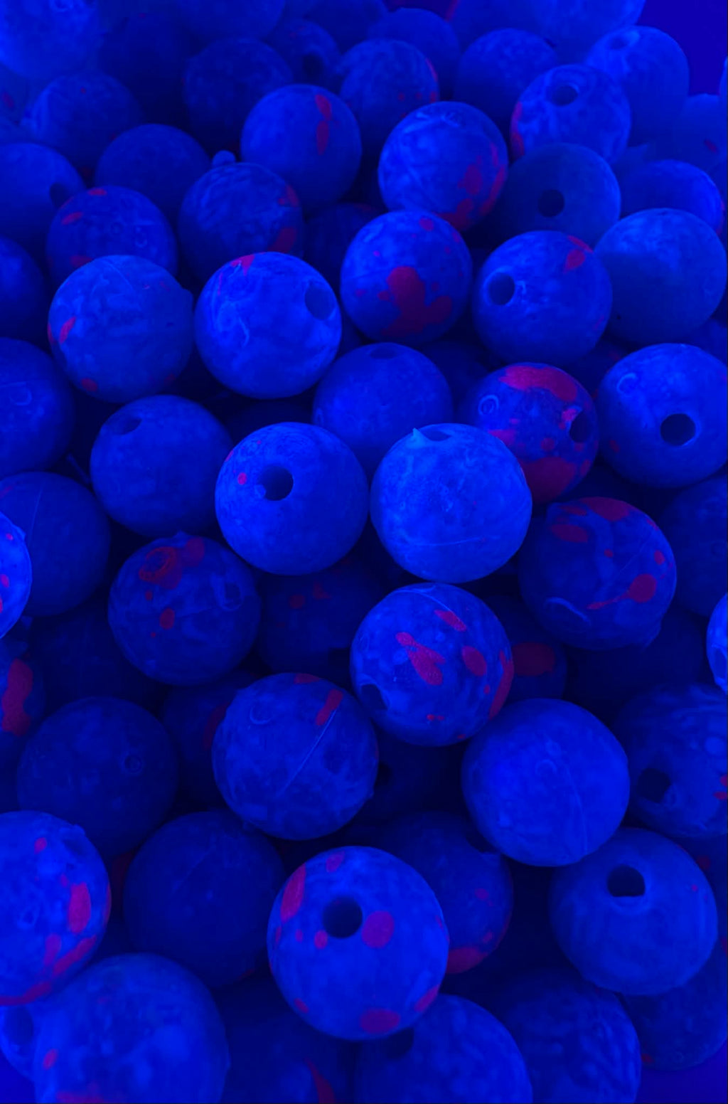 Beadhog UV glow fishing beads, deep blue with pink speckles and drilled hole