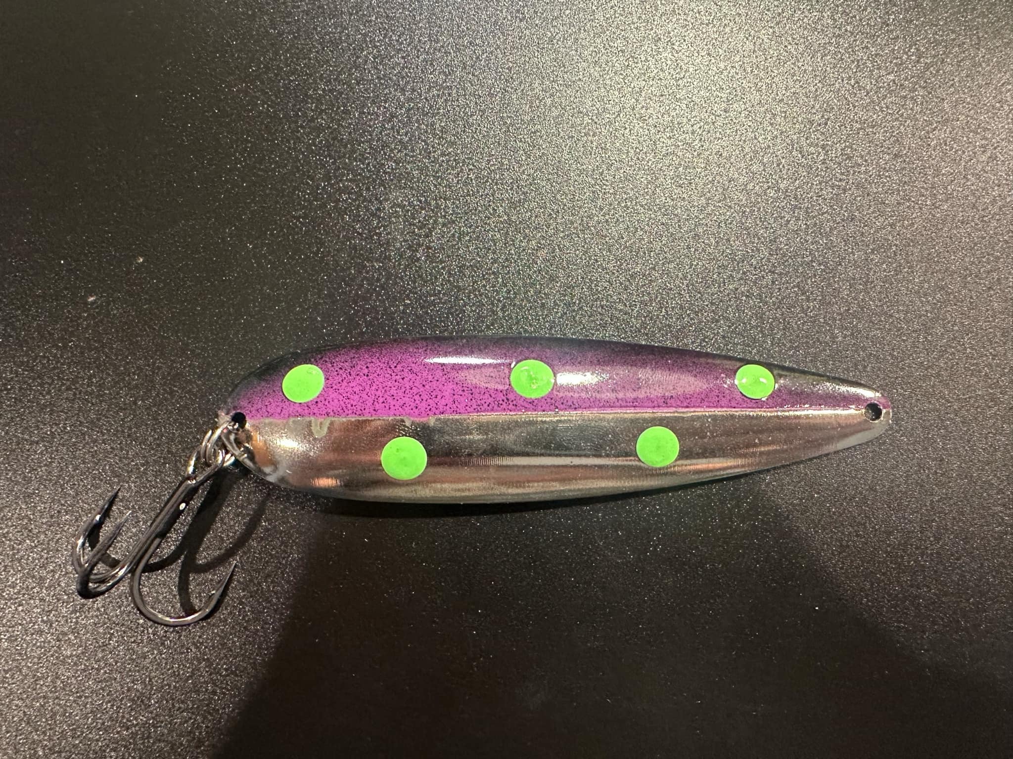 Jupiter Trolling Spoon, purple metal body with neon green dots and treble hooks.