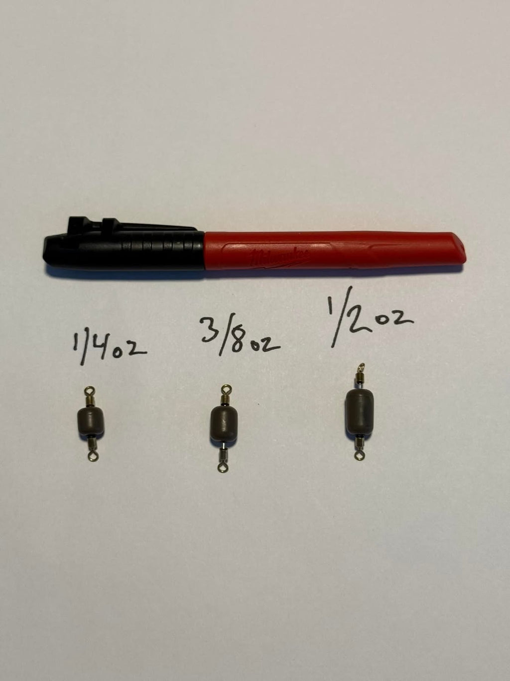 Assorted inline tungsten sinkers: 1/4 oz, 3/8 oz, and 1/2 oz weights
