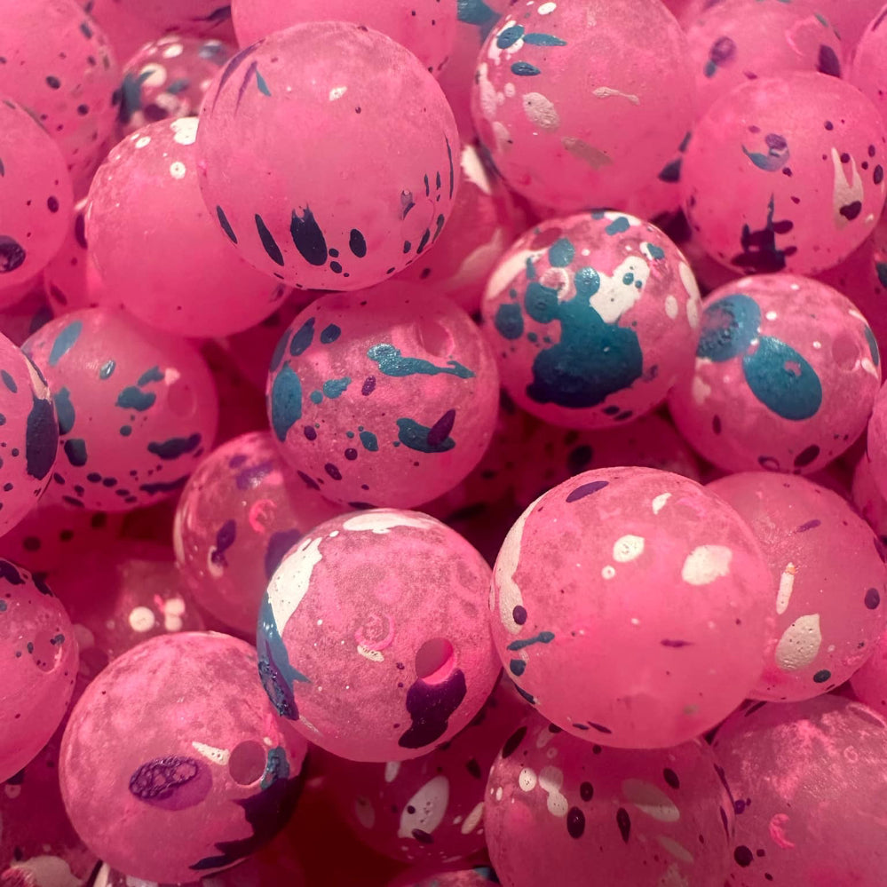 UV-glow fishing beads in pink with speckled pattern