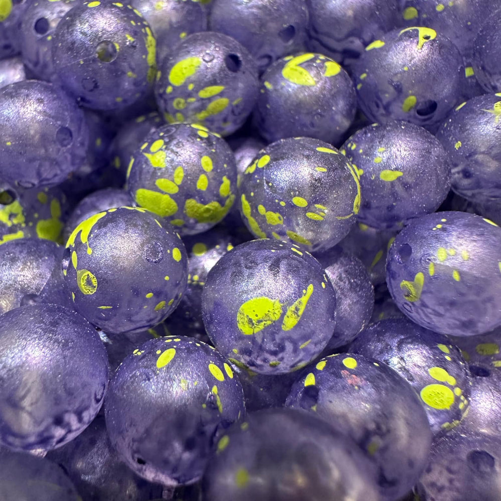 Lemon Berry UV glow fishing beads, purple spheres with yellow spots and speckles