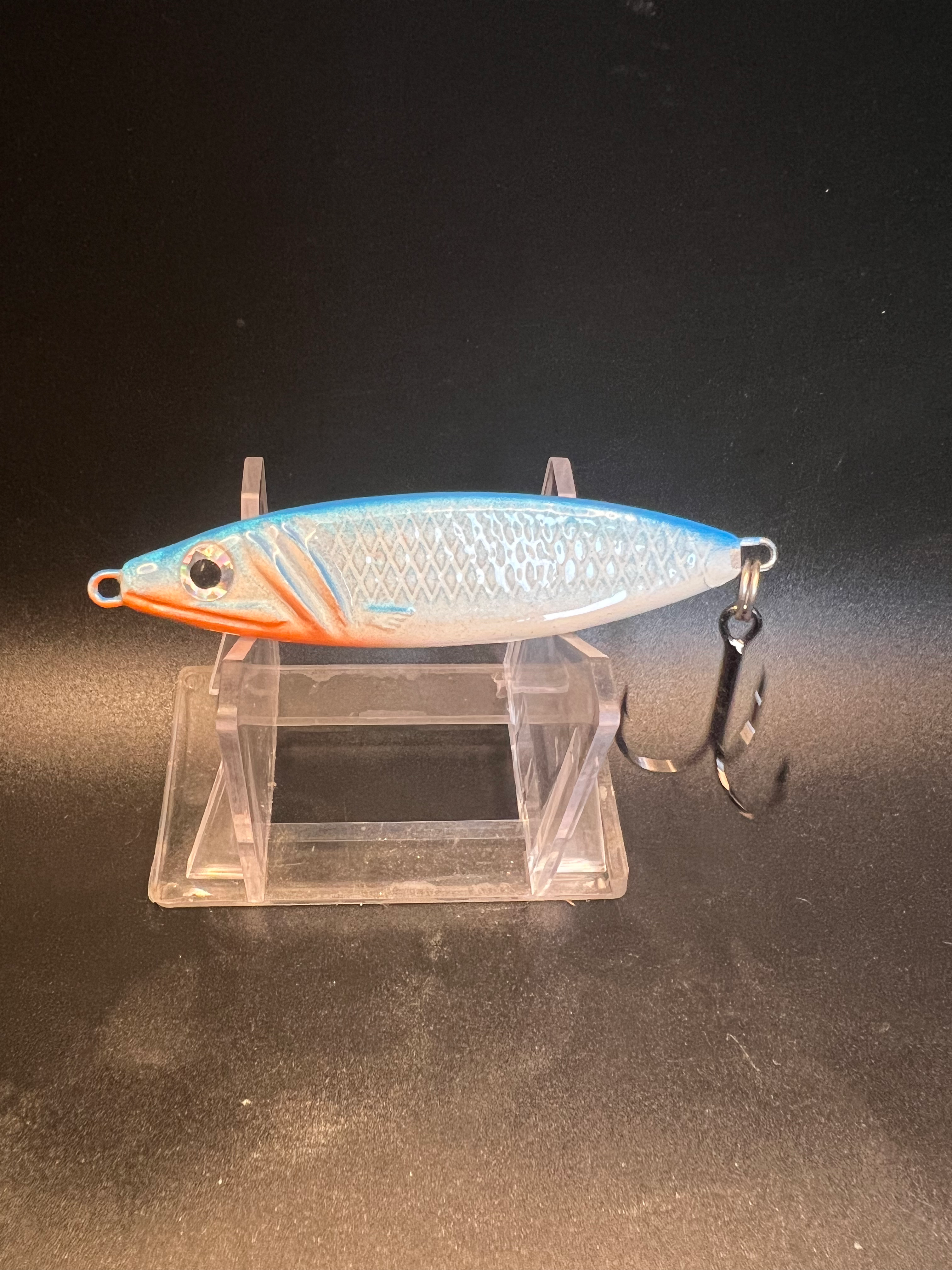 UV 1.25 oz Salmon jigging spoon, blue-white scale pattern with orange side stripe