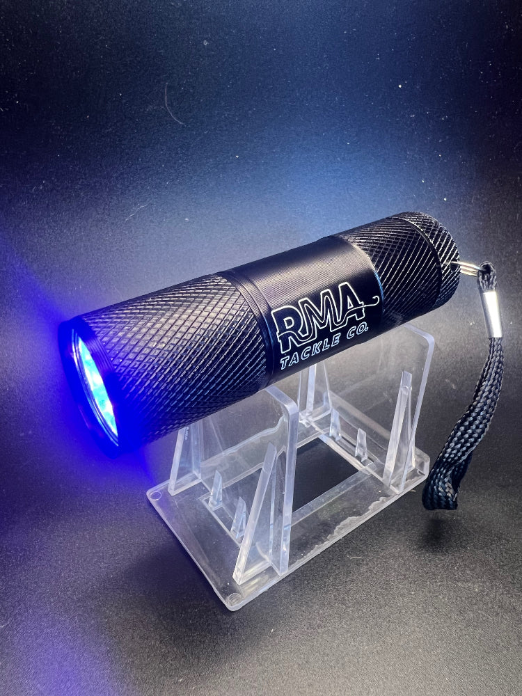 UV glow flashlight for fishing lures, black body with blue UV beam