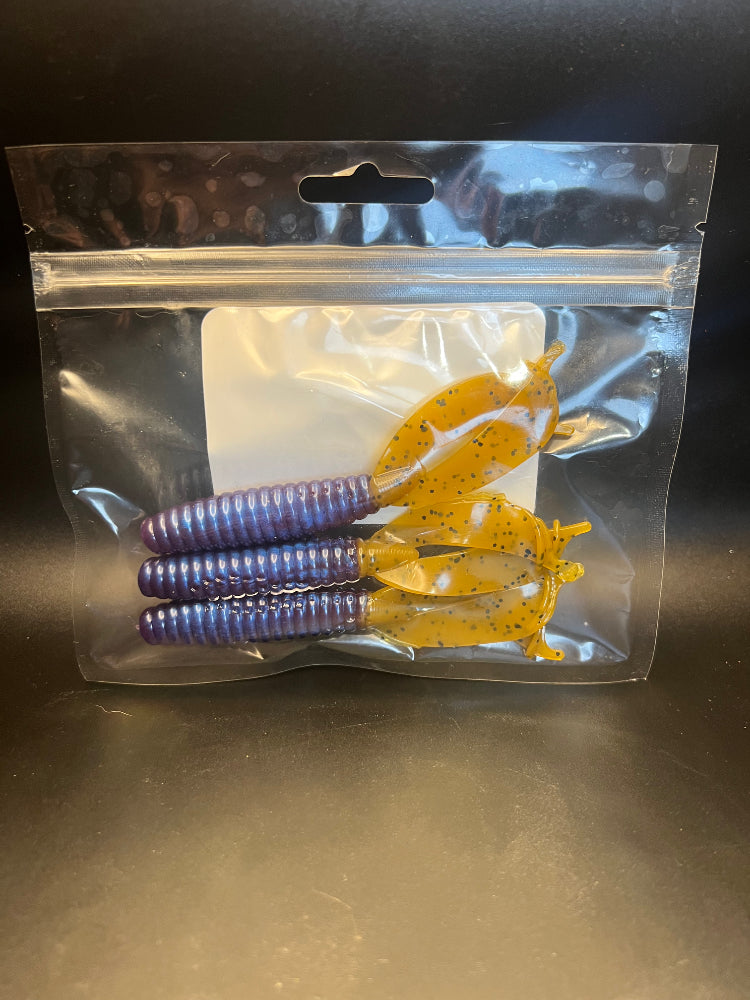 Soft plastic crayfish lure set in purple bodies with speckled yellow claws