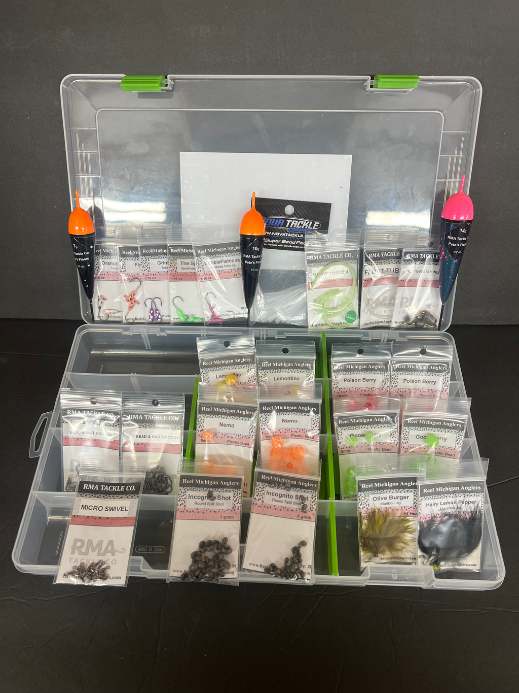 Open RMA Steelhead Kit with multiple packaged lures, hooks, and line components