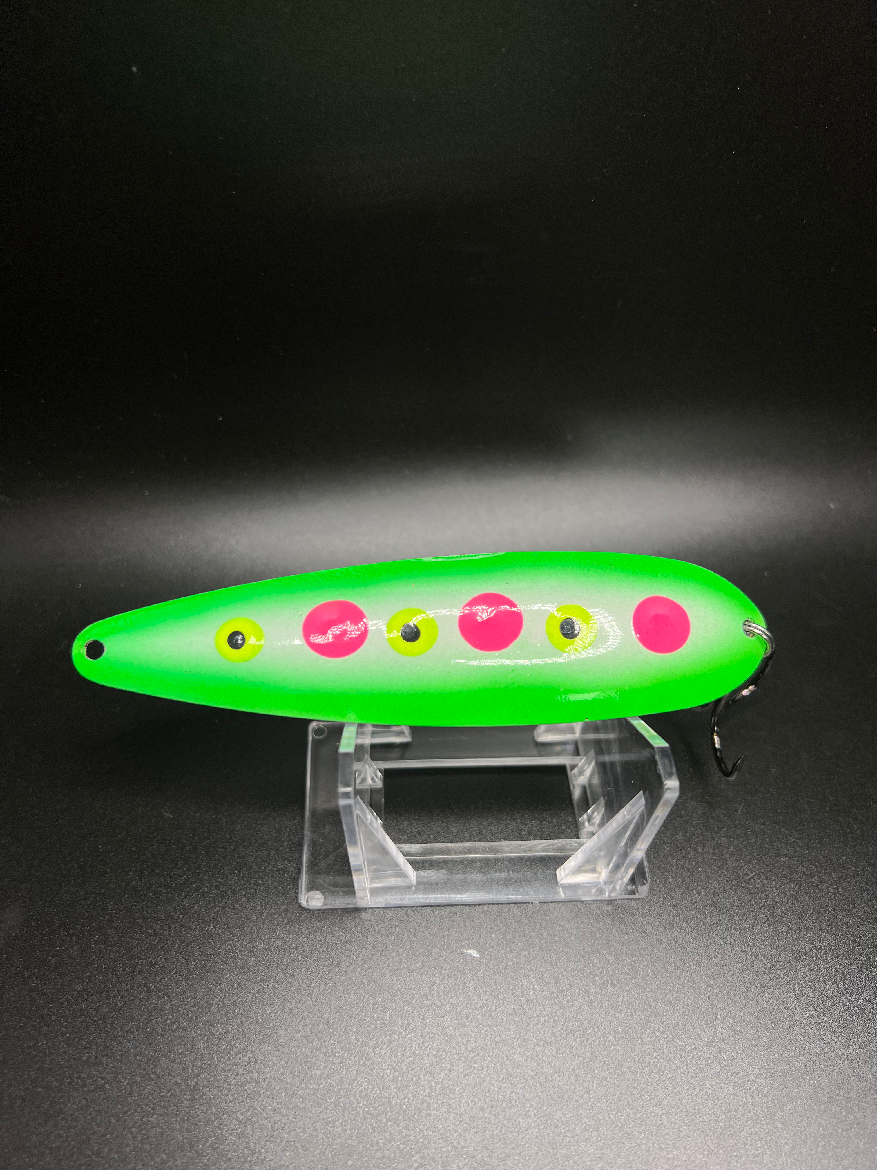 Green trolling spoon lure with pink and yellow dot inlays and metal hook, RMA Tackle Co