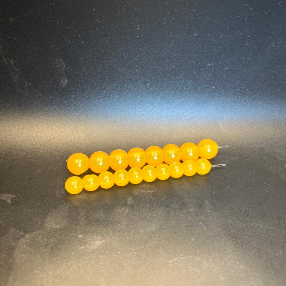 Orange cream Roeda fishing lure bead strand, yellow-orange round beads