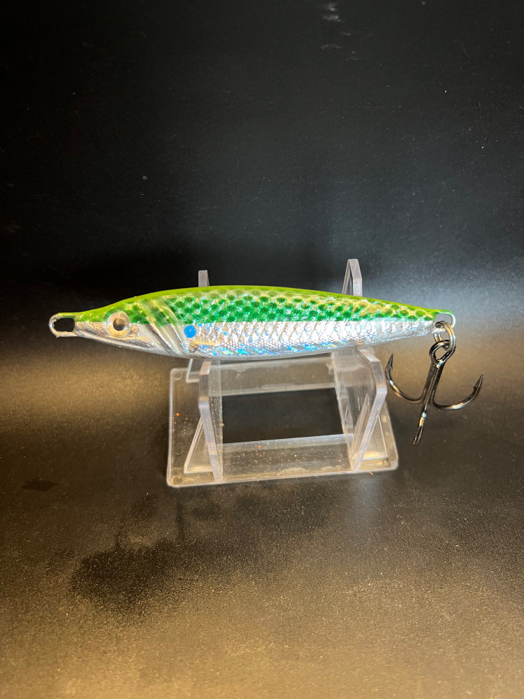 Shadtallica UV jigging spoon, iridescent silver with green top and blue dot