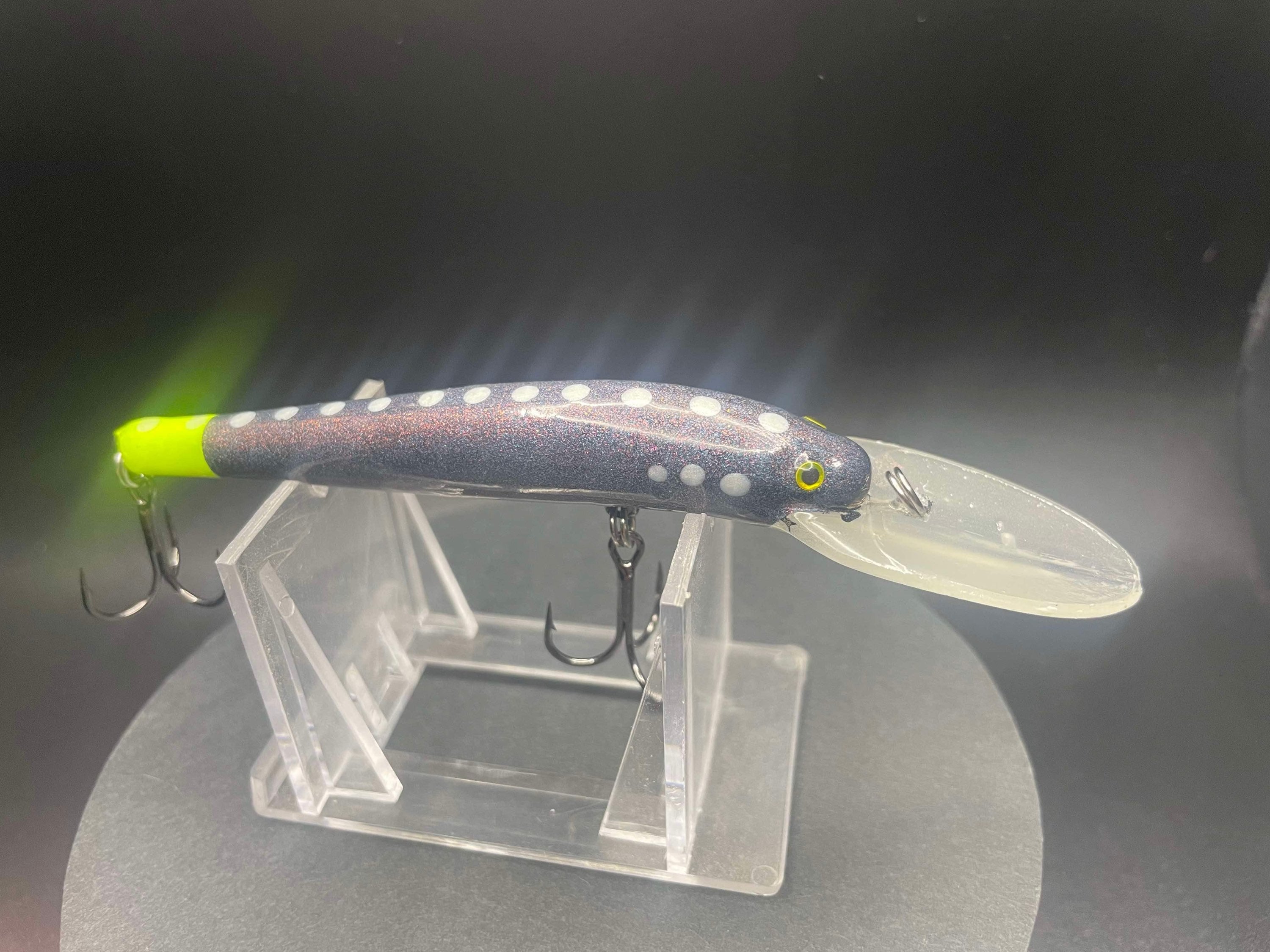 Static Saturn Lightningstick UV Glow fishing lure with glitter-blue body, green head, clear lip